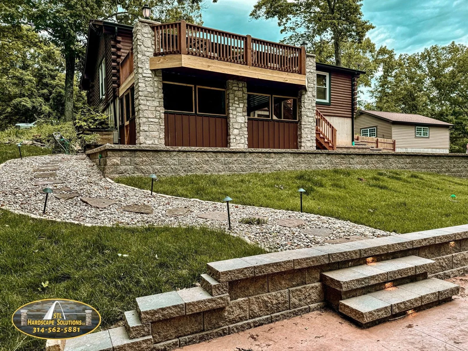 STL Hardscape Solutions outdoor living project with stone walls and steps in Greater St. Louis