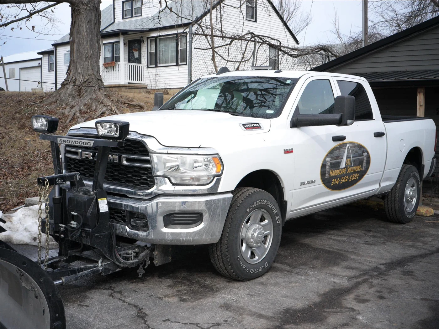STL snow plow truck - completed hardscape project in St. Louis