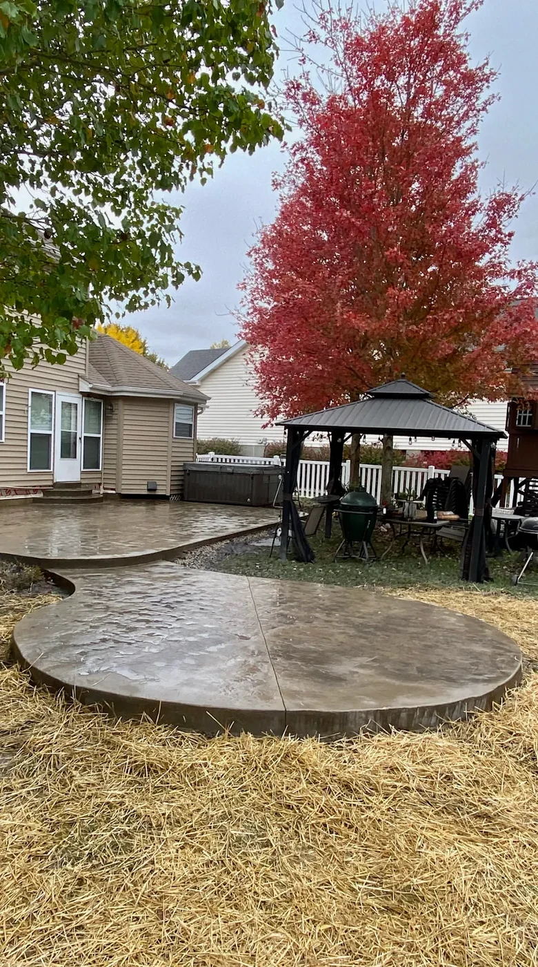 Stamped concrete circular patios - completed hardscape project in St. Louis