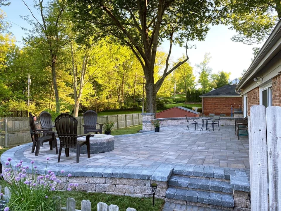 Raised patio with fire pit - completed hardscape project in St. Louis