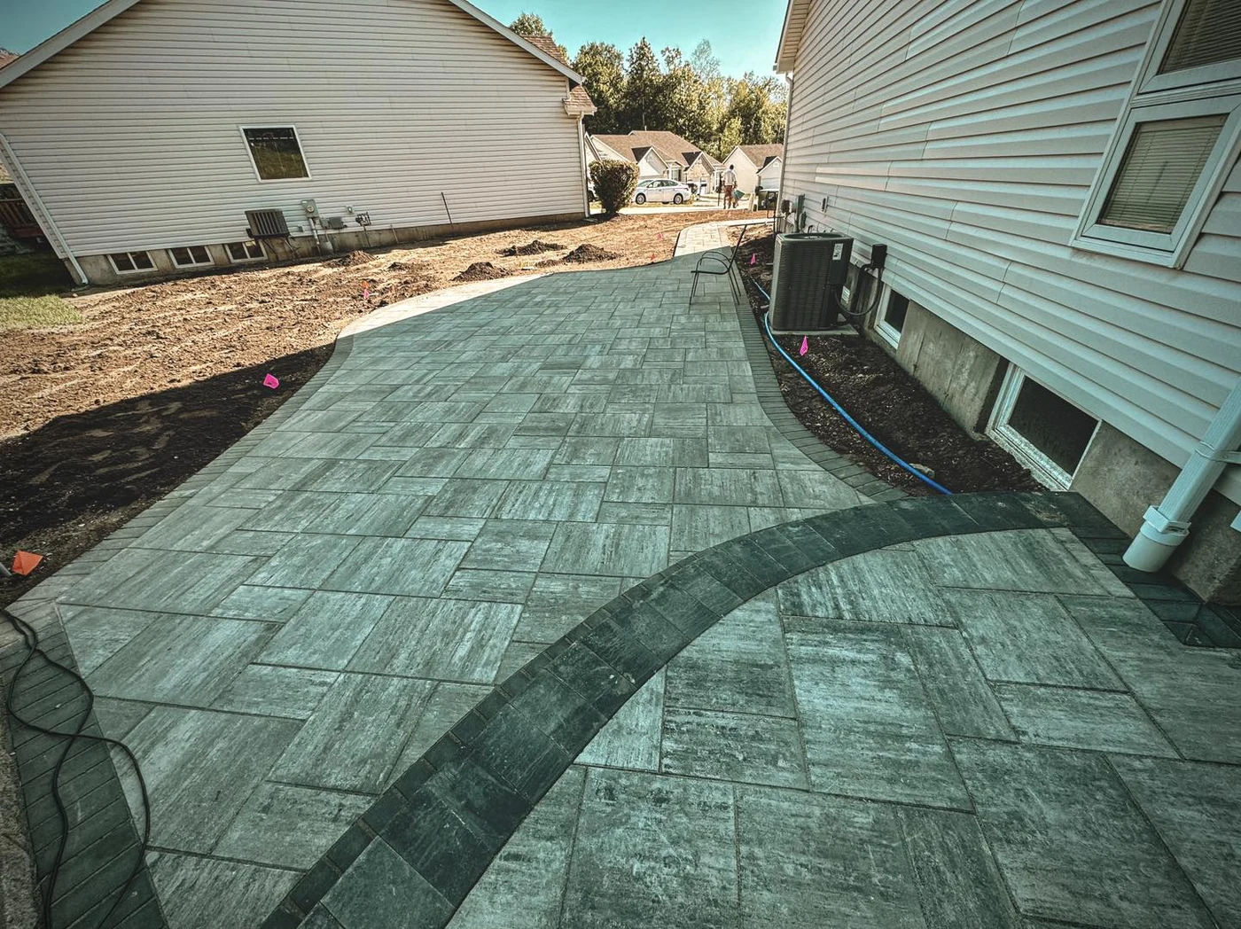 Modern patterned paver patio - completed hardscape project in St. Louis
