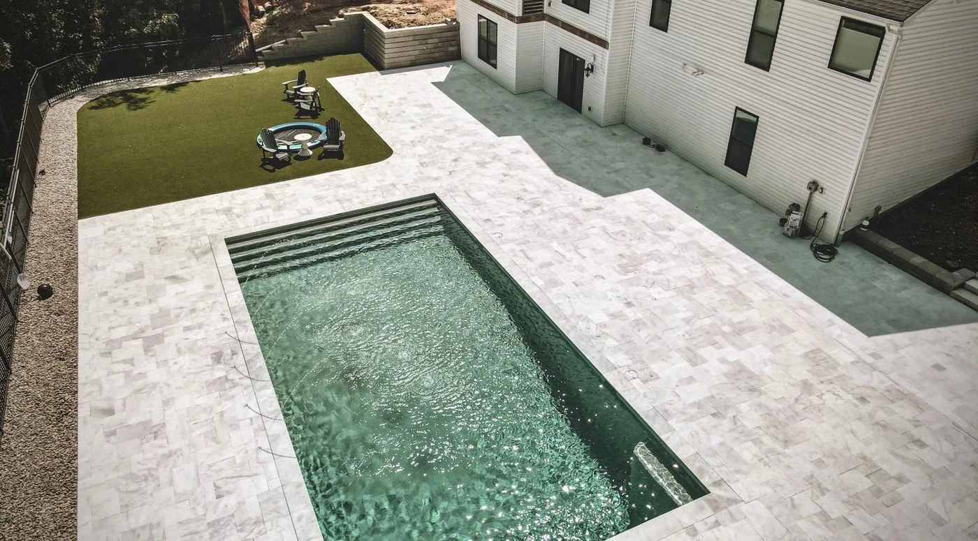 Pool, patio, and lawn lounge - completed hardscape project in St. Louis