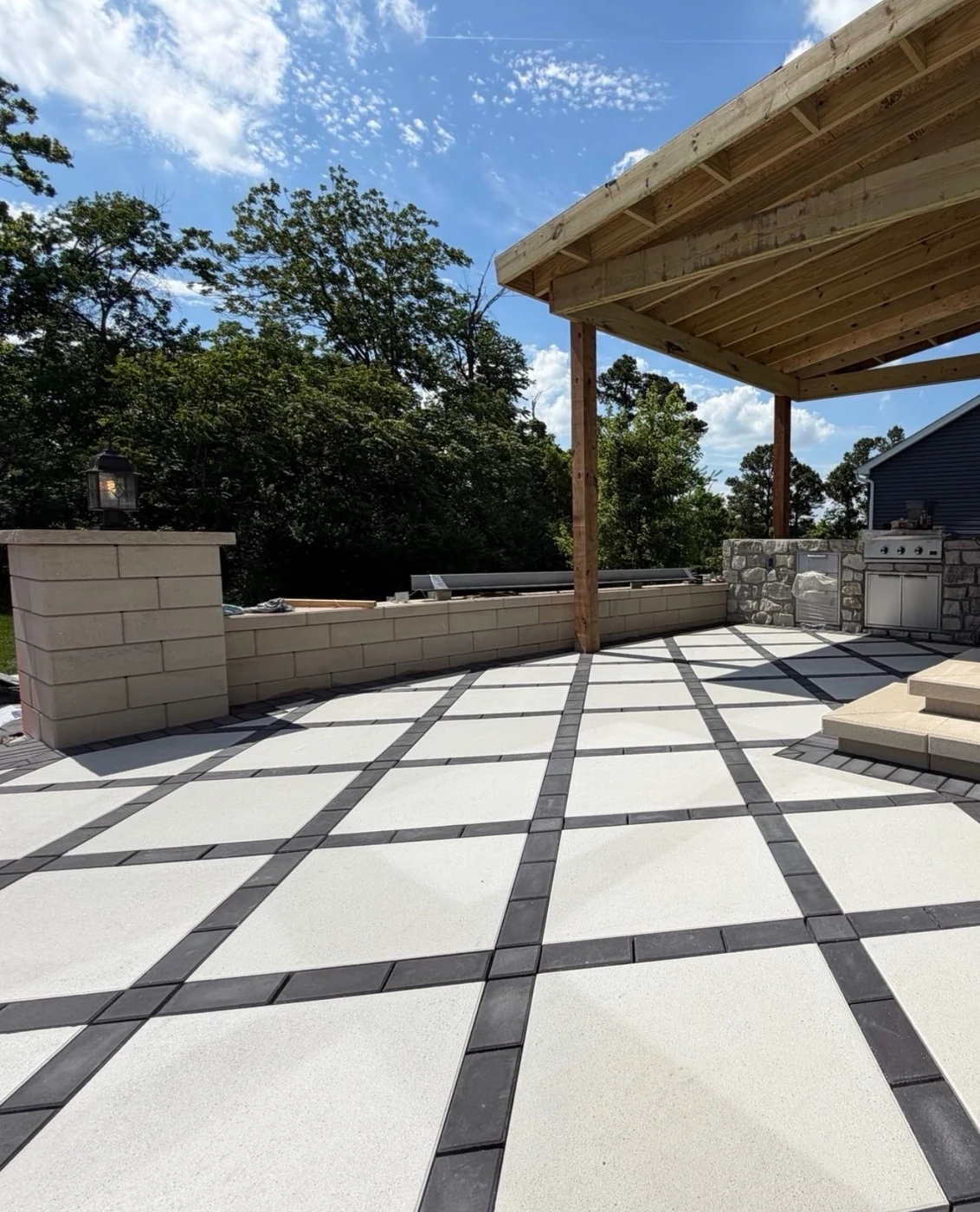 Covered outdoor kitchen terrace - completed hardscape project in St. Louis