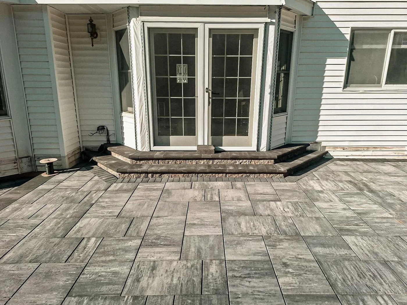 Multi-level paver patio steps - completed hardscape project in St. Louis