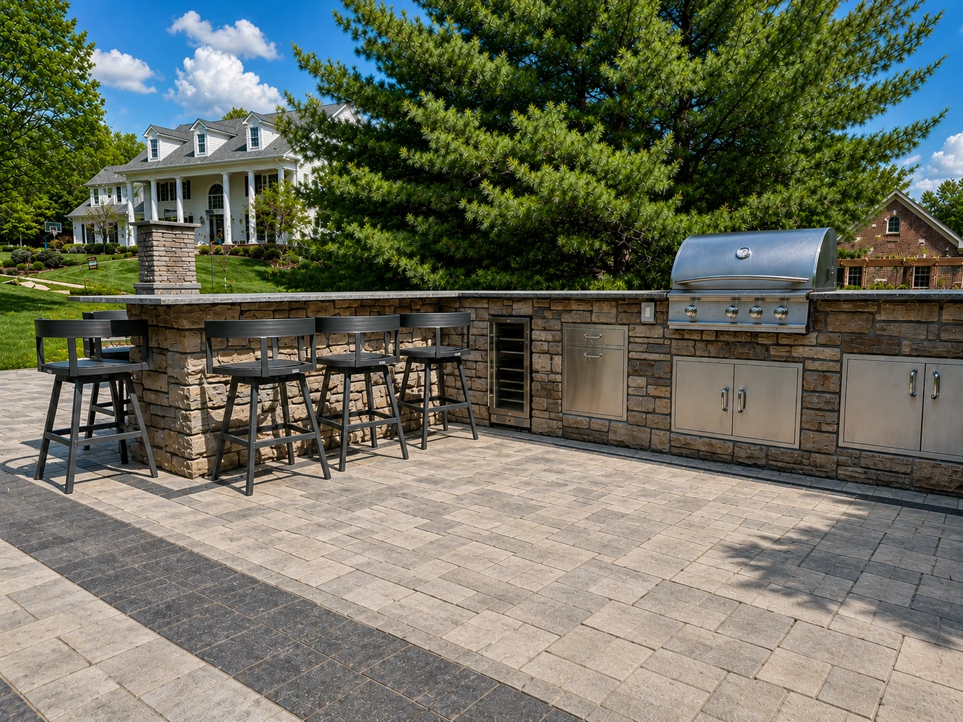 Built-in outdoor kitchen bar - completed hardscape project in St. Louis