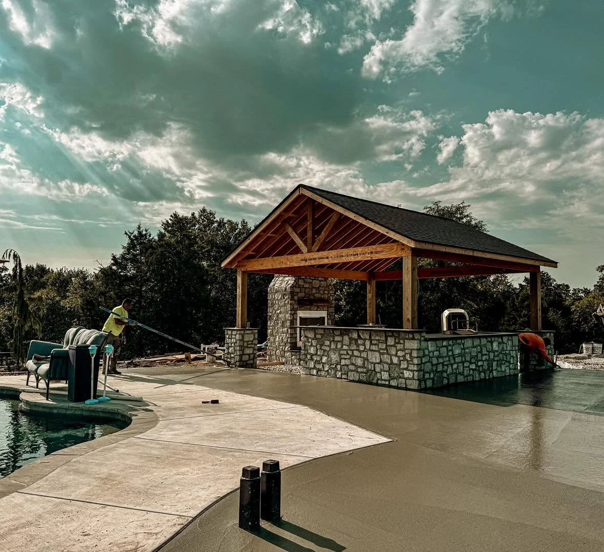 Covered stone pool pavilion - completed hardscape project in St. Louis